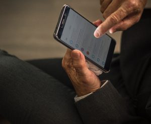 man checking email on phone